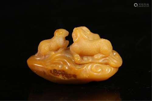 A SOAPSTONE CARVED DECORATION OF THREE GOATS