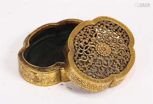 A GILT BRONZE FLORAL BOX AND HOLLOW-OUT COVER