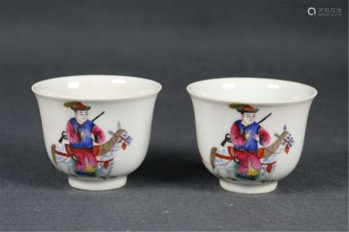 PAIR OF FAMILLE ROSE FIGURAL CUPS