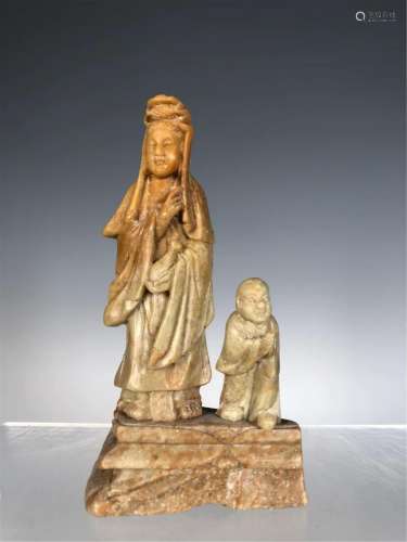 A CHINESE STONE QIAOSE CARVED GUANYIN FIGURE STATUE