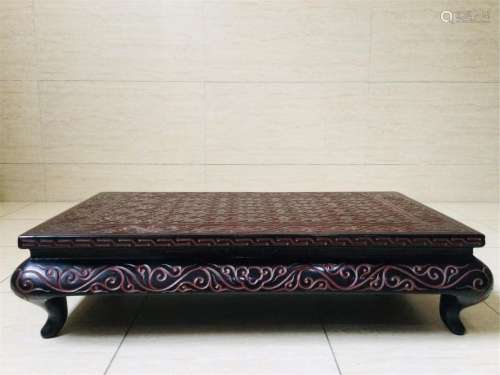 A CHINESE CARVED LACQUER WOOD TEA TABLE