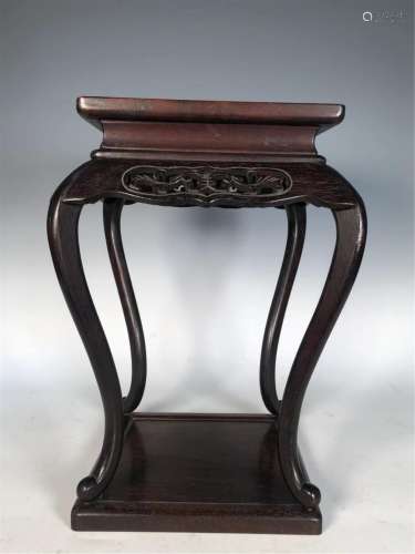 A CHINESE HARDWOOD CARVED FLOWERS INCENSE STAND