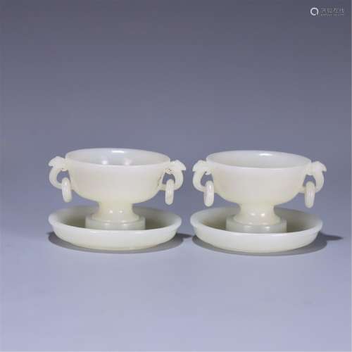 PAIR OF CARVED JADE STEM CUPS AND SAUCERS