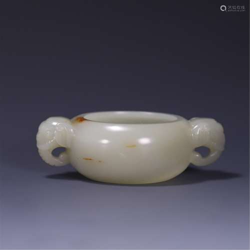 A CARVED JADE WATER POT WITH ELEPHANT HANDLES