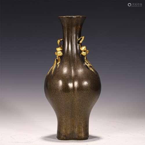 A GILT BRONZE VASE WITH PEACH HANDLES