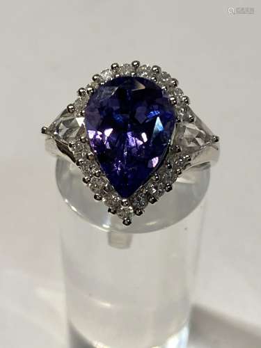 PEAR SHAPED TANZANITE AND DIAMOND CLUSTER RING