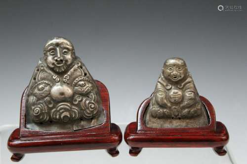 Two Chinese silver figurines on wooden stands