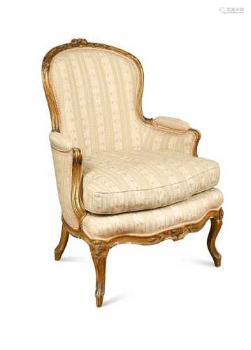 A Louis XV style giltwood and gesso arm chair, late 19th cen...