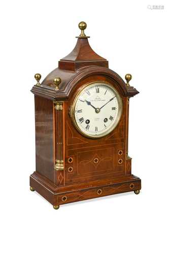 A mahogany and inlaid mantel clock by Dent, 20th century,