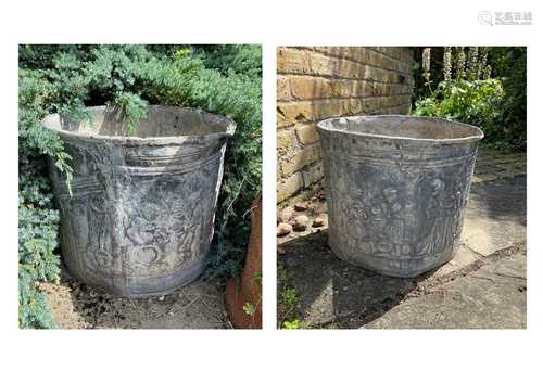 A pair of circular planters,