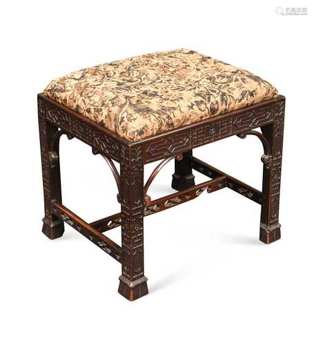 A mahogany stool in the Chippendale manner,