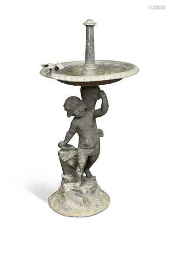 A lead fountain birdbath,