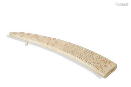 An Inuit walrus tusk cribbage board by H. F. Bland, 1934,