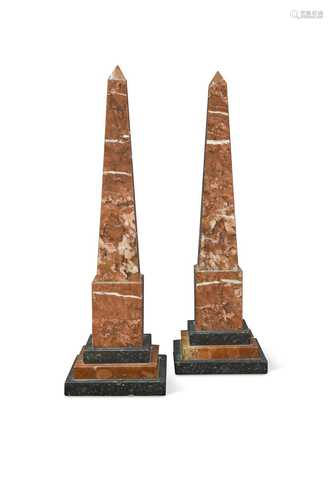 A pair of large marble obelisks,