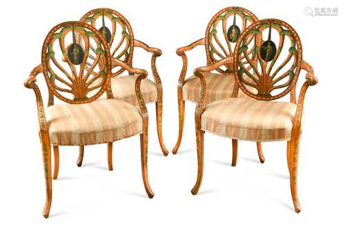 A set of four painted satinwood armchairs, late 19th century...