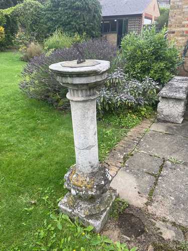 A Portland stone sundial,