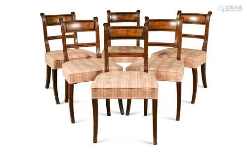 A set of six Regency mahogany sabre leg dining chairs,