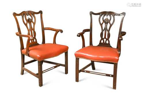 A pair of George III mahogany arm chairs,