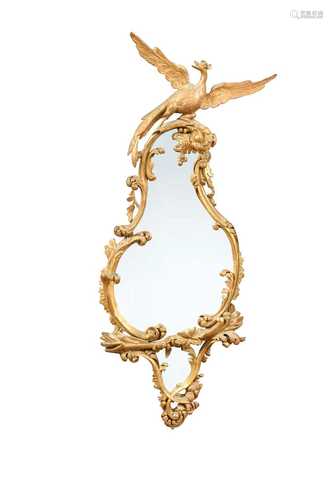 A carved giltwood rococo style mirror, 18th century,