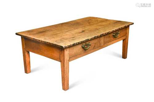 A cherry wood low table, 19th century,