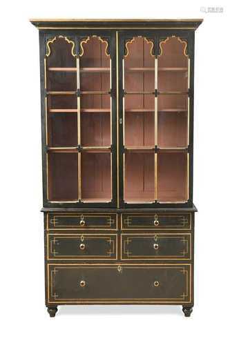 A black painted and gilt lined glazed bookcase, 20th century...