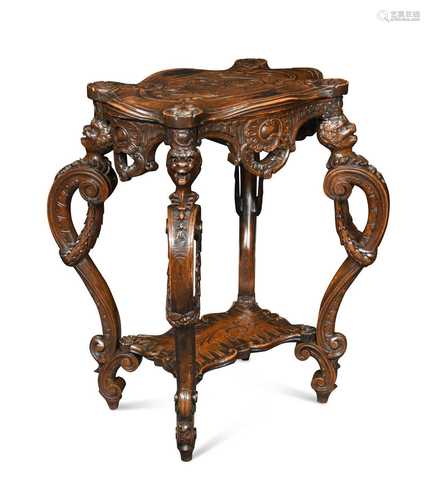 A French walnut two tier gueridon,