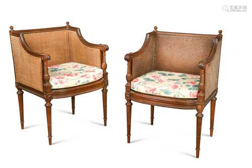 A pair of neo-classical mahogany bergeres, early 20th centur...