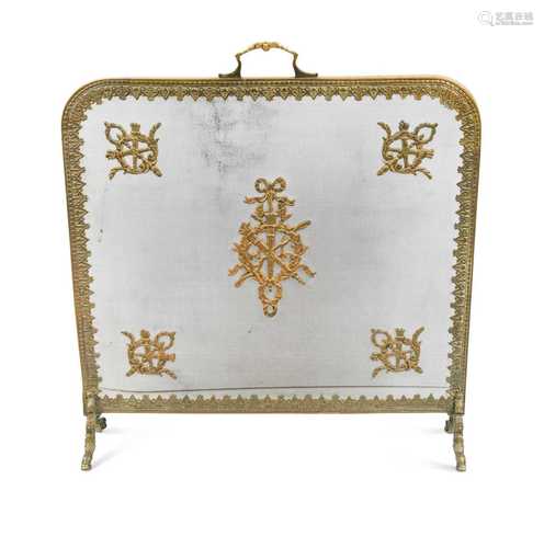 A gilt metal mesh fire guard,