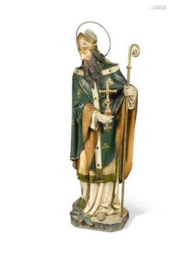 A carved and polychrome model of St Patrick,