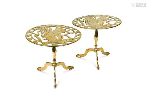 A pair of brass pedestal trivets, 19th century,