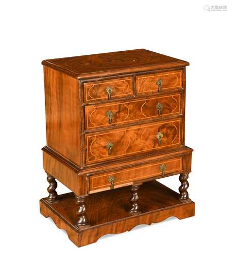 A miniature walnut William & Mary style chest on stand, 20th...