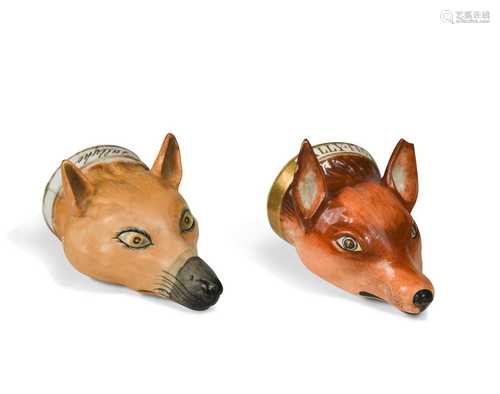 Two Staffordshire fox head stirrup cups, 19th century,