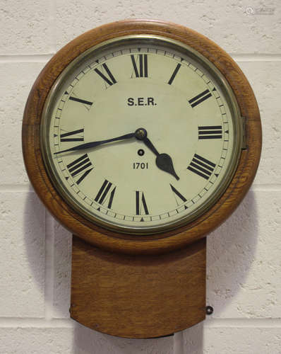 A George V South Eastern Railway oak cased drop dial wall ti...