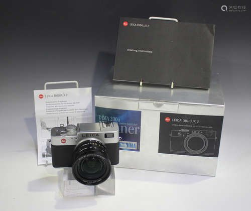 A Leica Digilux 2 camera, No. 3013830, with DC Vario-Summicr...