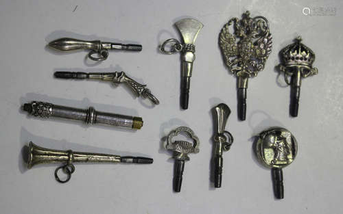 A group of ten watch keys, the terminals including a twin he...