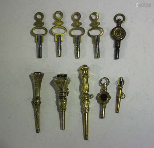 A group of five mostly Victorian watch keys, including a Eur...