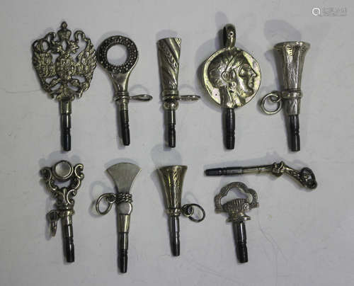 A group of ten watch keys, the terminals including a pistol ...