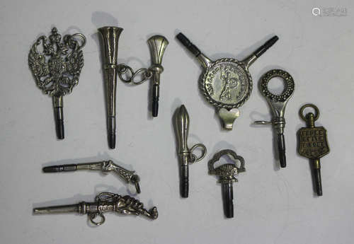 A group of ten watch keys, the terminals including a hand ho...