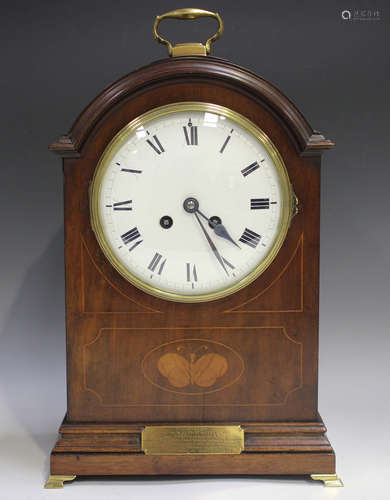 An Edwardian mahogany mantel clock with eight day movement s...