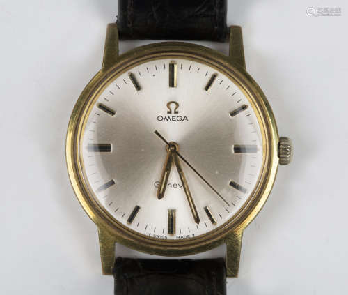 An Omega Genève gilt metal fronted and steel backed gentlema...