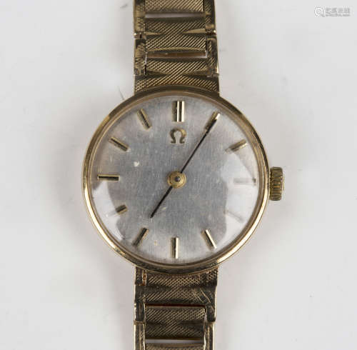 An Omega 9ct gold lady's bracelet wristwatch, the signed mov...