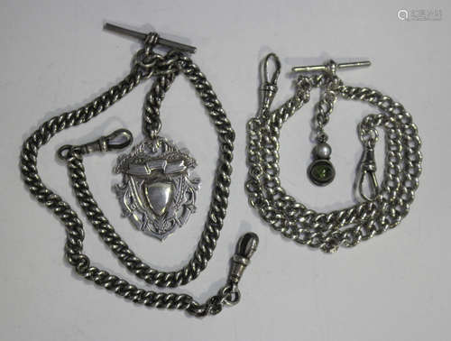 A silver uniform curblink watch Albert chain, fitted with tw...