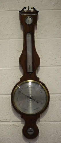 A George III mahogany wheel barometer of large proportions, ...