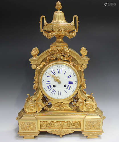 A late 19th century French ormolu cased mantel clock with ei...