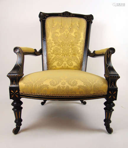 A late Victorian ebonized and parcel gilt open arm salon cha...