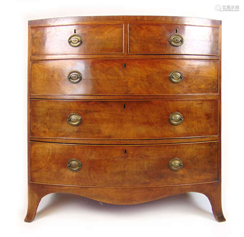 A late 18th century mahogany bow front chest of two short ov...