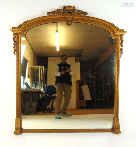 A 19th century gilt wood over mantle mirror,