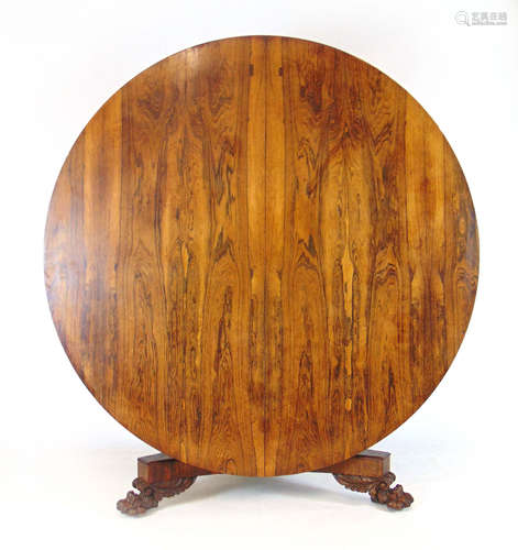 An early 19th century rosewood breakfast table,