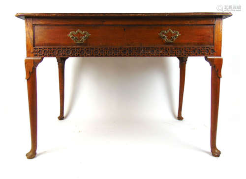 An 18th century elm and mahogany banded side table,