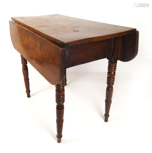 A 19th century elm drop leaf table, the top over turned legs...